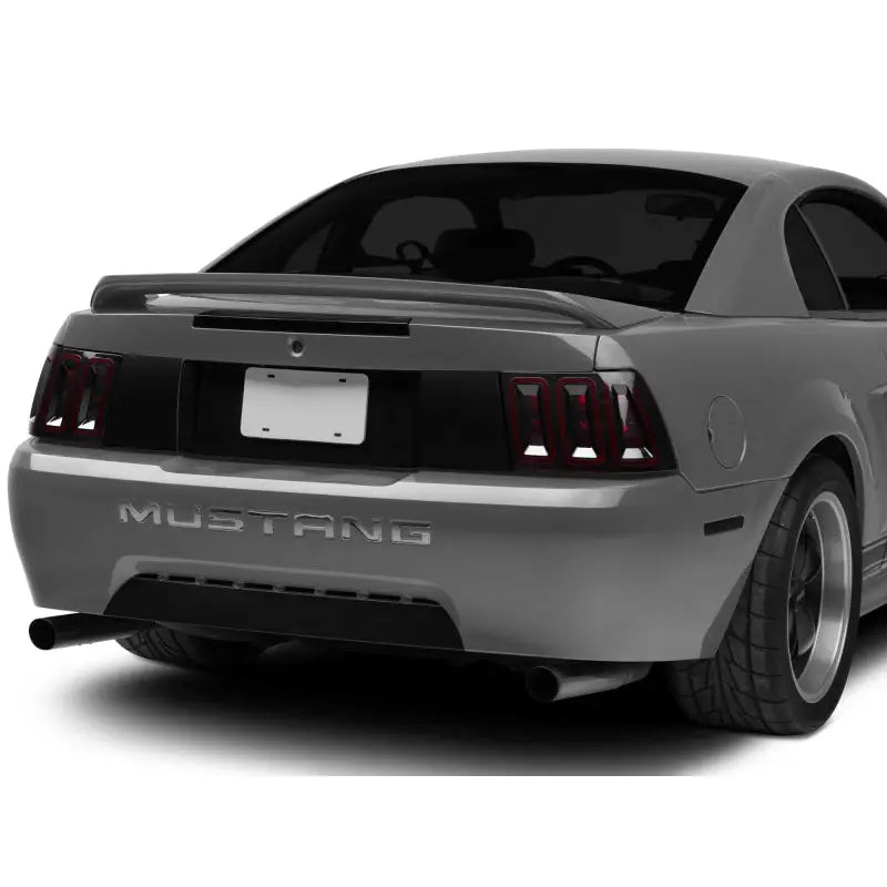 Raxiom 100807 Raxiom 99-04 Ford Mustang Excluding 99-01 Cobra Icon LED Tail Lights- Black Housing (Smoked Lens)