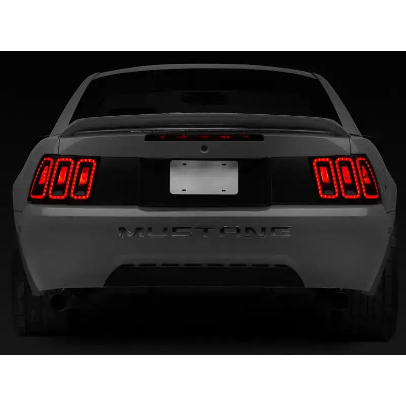 Raxiom 99-04 Ford Mustang Excluding 99-01 Cobra Icon LED Tail Lights- Black Housing (Smoked Lens) - Truck & Automotive