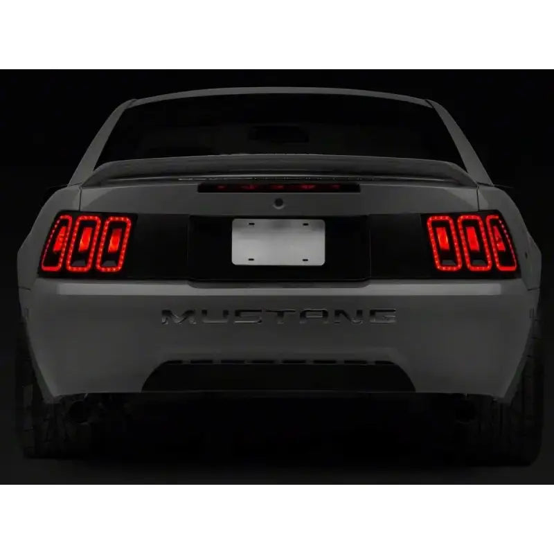 Raxiom 99-04 Ford Mustang Excluding 99-01 Cobra Icon LED Tail Lights- Black Housing (Smoked Lens) - Truck & Automotive
