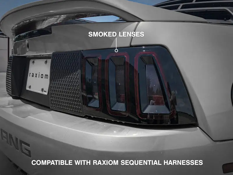 Raxiom 99-04 Ford Mustang Excluding 99-01 Cobra Icon LED Tail Lights- Black Housing (Smoked Lens) - Truck & Automotive
