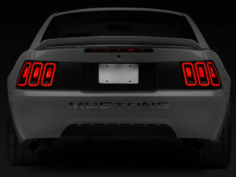 Raxiom 99-04 Ford Mustang Excluding 99-01 Cobra Icon LED Tail Lights- Black Housing (Smoked Lens) - Truck & Automotive