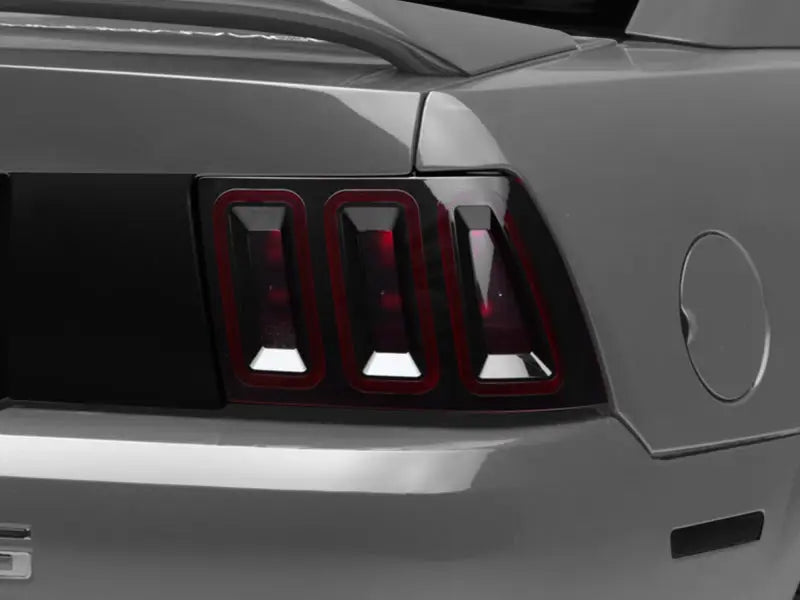 Raxiom 99-04 Ford Mustang Excluding 99-01 Cobra Icon LED Tail Lights- Black Housing (Smoked Lens) - Truck & Automotive
