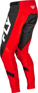 Red and black motocross pants with white FLY branding showcasing durable stretch technology