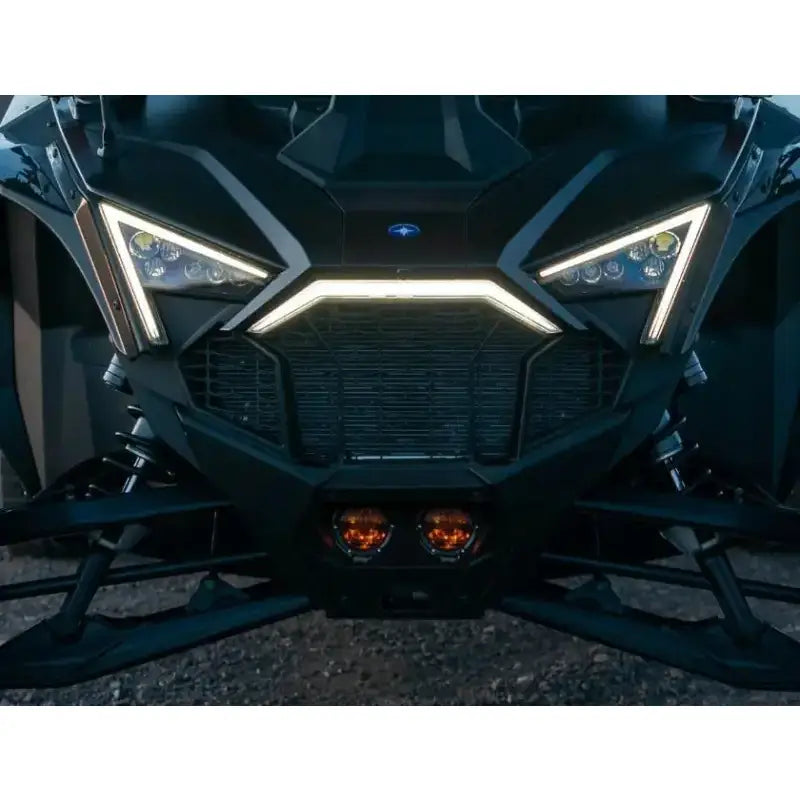 Front view of dark off-road vehicle with Razor 360 Series Amber Pro Grille Light Kit