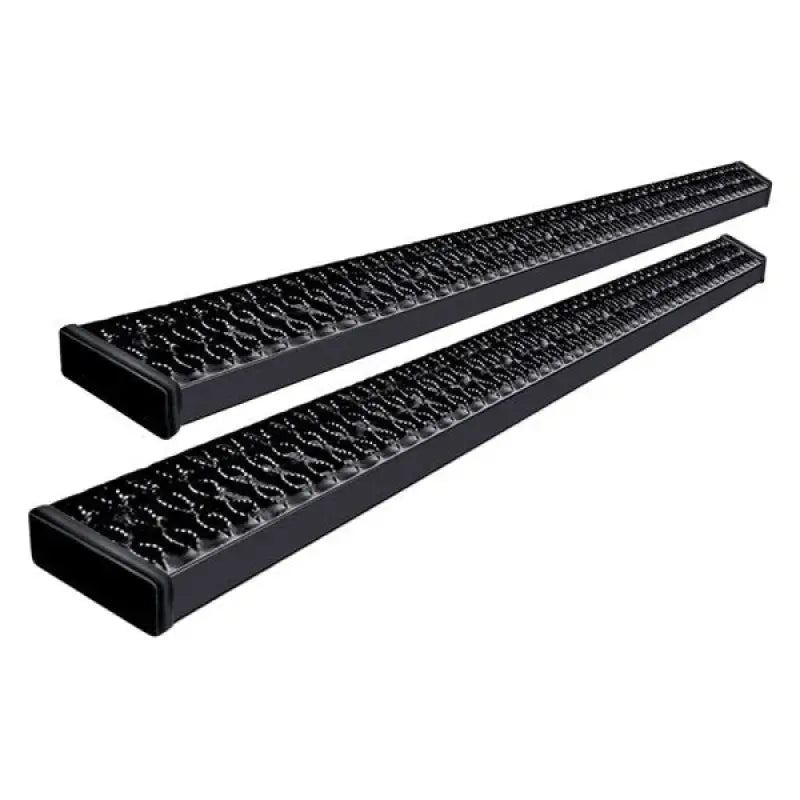 Two black textured running boards.