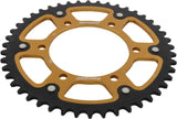 Gold and black motorcycle sprocket for Yamaha and Honda rear stealth sprocket upgrade