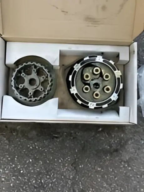 Two motorcycle clutch assemblies in a box for Rekluse Racing Radius Cx Clutch Yam