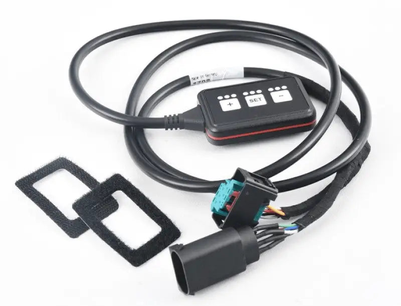 Remus Throttle Responder black tuning module with coiled cable and buttons