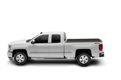Silver four-door pickup truck for Toyota Tundra CrewMax Retrax IX bed cover