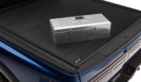 Silver diamond-plate toolbox for Toyota Tundra CrewMax Retrax IX truck bed