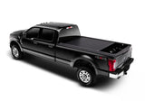 Black Ford F-Series pickup with tonneau cover for F-150 Super Crew & Super Cab