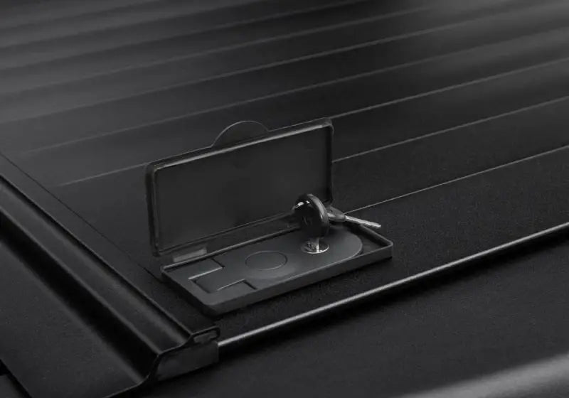 Dark gray RetraxPRO MX tonneau cover for F-150 Super Crew super cab with lock keys