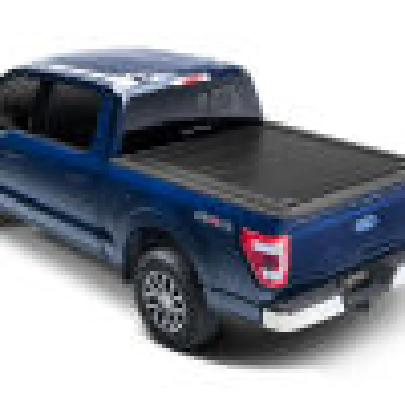 Dark blue F-150 Super Crew pickup with black bed cover and chrome bumper