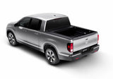 Silver Honda Ridgeline truck bed with RetraxPRO MX sealed ball-bearing rollers