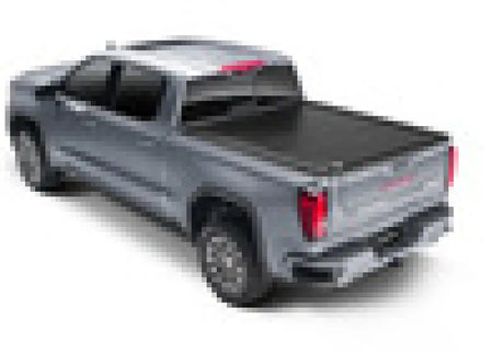 Gray pickup truck with bed cover showing RetraxPRO MX for Silverado Sierra truck bed