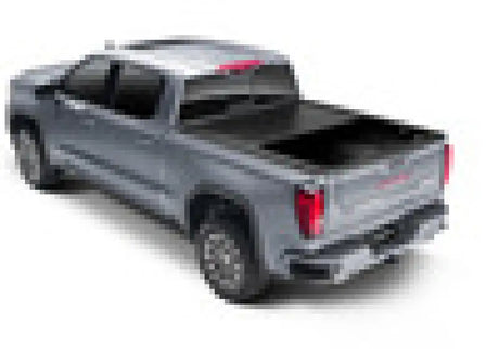 Gray pickup truck with bed cover featuring RetrxPro for Silverado Sierra truck bed