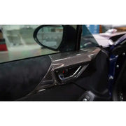 Revel GT Dry Carbon trim covers for car door interior with sleek dry carbon finish