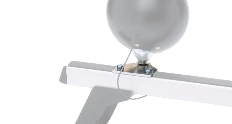 Silver balloon attached to metal frame used as a work light bracket on Rhino-Rack Crossbar