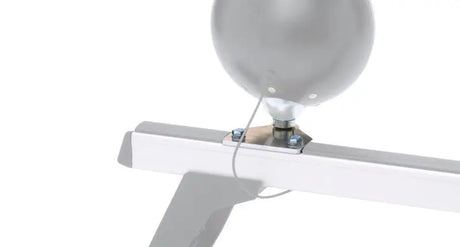 Silver balloon attached to metal frame used as a work light bracket on Rhino-Rack Crossbar