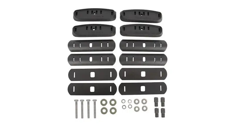 Rhino-Rack Generic RCP Base Kit - 4 pcs for RC and RV roof rack systems, black molded pads, screws, washers, and bolts in set