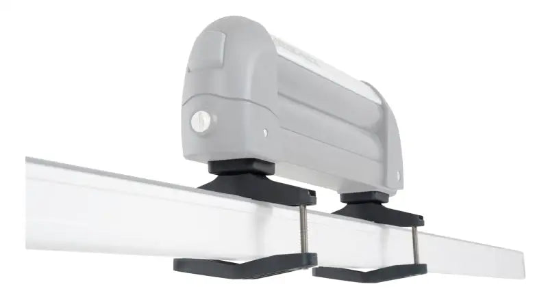 Gray awning with black mounting hardware for Rhino-Rack Heavy Duty Fitting Kit