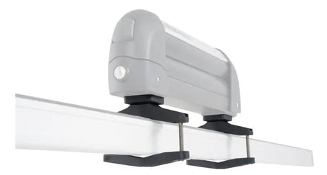 Gray awning with black mounting hardware for Rhino-Rack Heavy Duty Fitting Kit