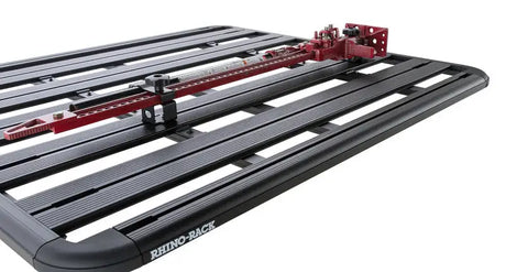 Rhino-Rack Pioneer High Lifting Jack Holder Bracket Set (Top Mount) attached to Pioneer System rooftop platform.