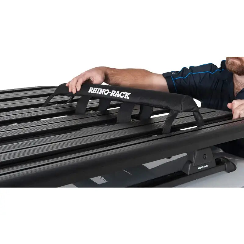 Black Rhino-Rack Pioneer wrap pads with straps and textured surface