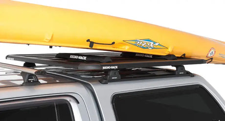 Yellow kayak on Rhino-Rack Pioneer wrap pads with straps