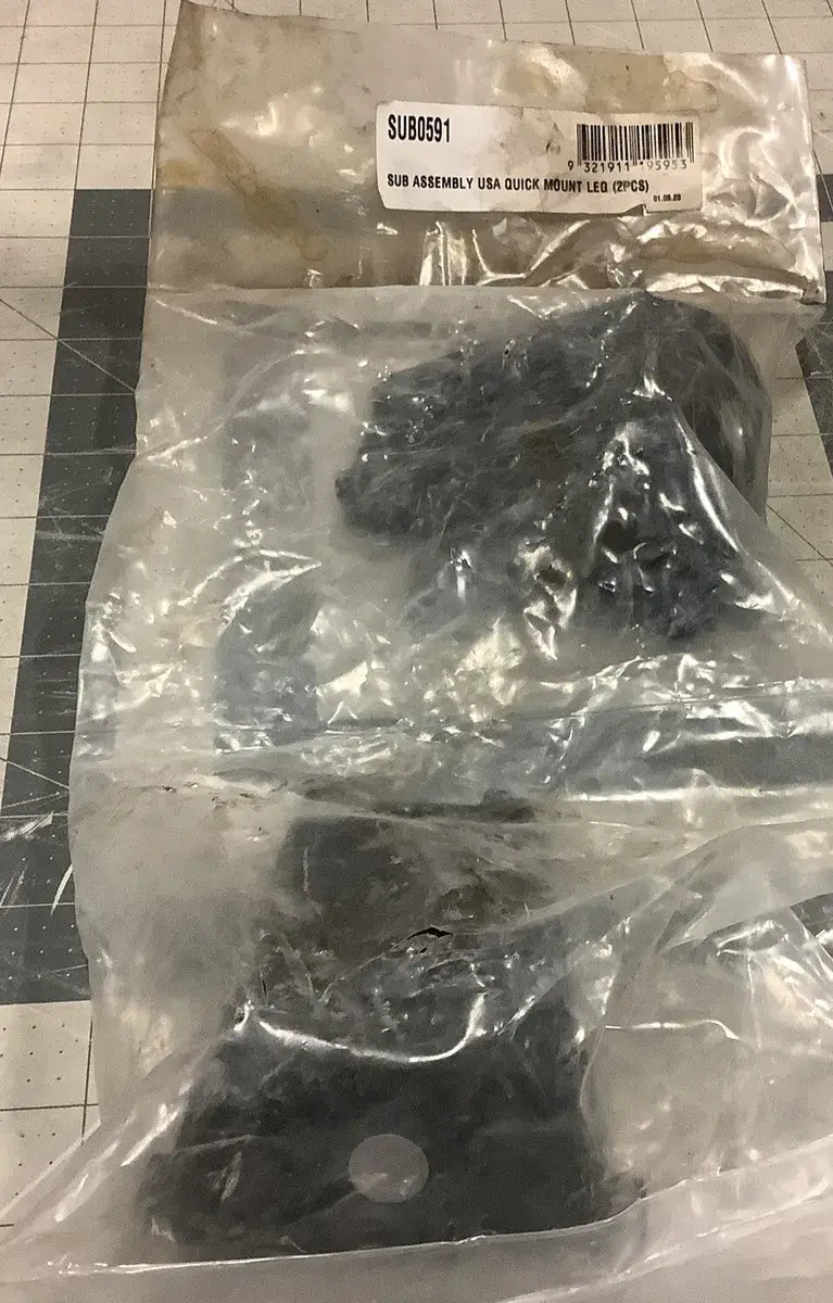 Plastic bag with dark mechanical parts labeled Rhino Rack Quick Mount Leg Sub Assembly
