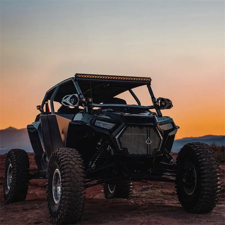 Black off-road vehicle with Rigid 430613 Revolve 30 Bar Wht Backlight for better visibility