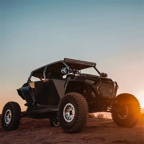 Black off-road vehicle with Rigid 430613 Revolve 30 Bar Wht Backlight installed