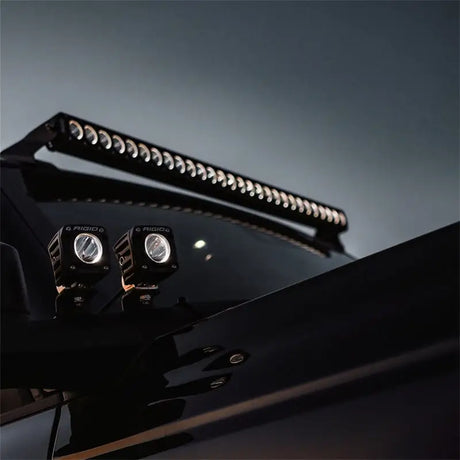 Illuminated off-road vehicle lights on Rigid 430613 Revolve 30’’ Bar Wht Backlight