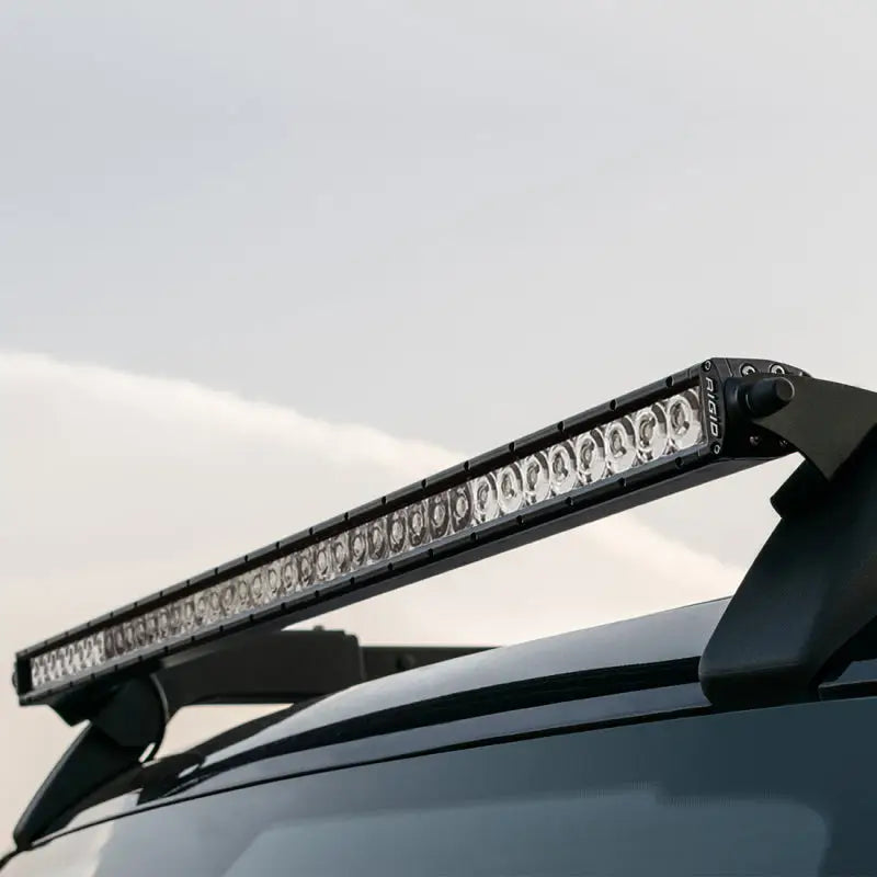 Roof-mounted LED light bar on Ford Bronco roof rack by Rigid Industries
