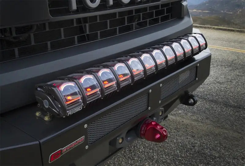 Rigid Industries 30in Adapt Light Bar mounted on a front bumper with unique LED technology and Active View(TM) Technology for changing conditions.