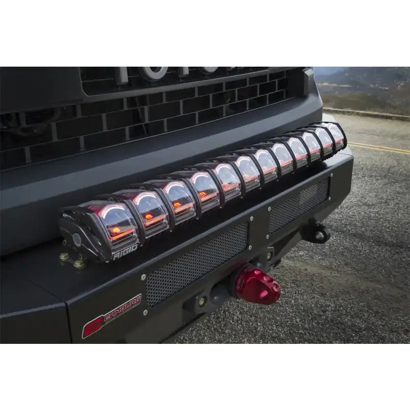 Rigid Industries 30in Adapt Light Bar mounted on a front bumper with unique LED technology and Active View(TM) Technology for changing conditions.