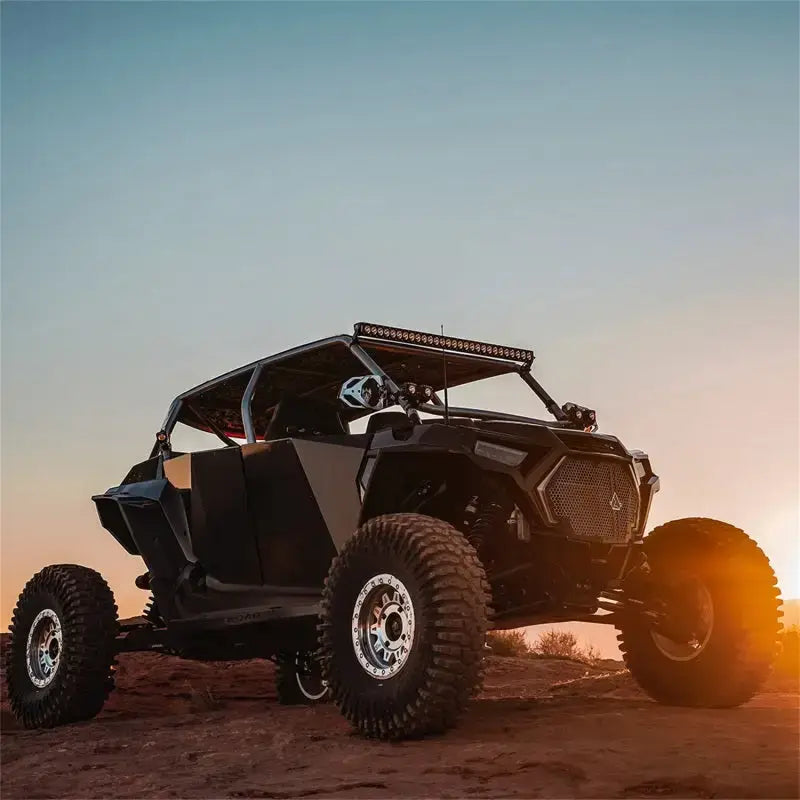 Black off-road vehicle with Rigid Industries Revolve 20in Bar featuring white trim ring