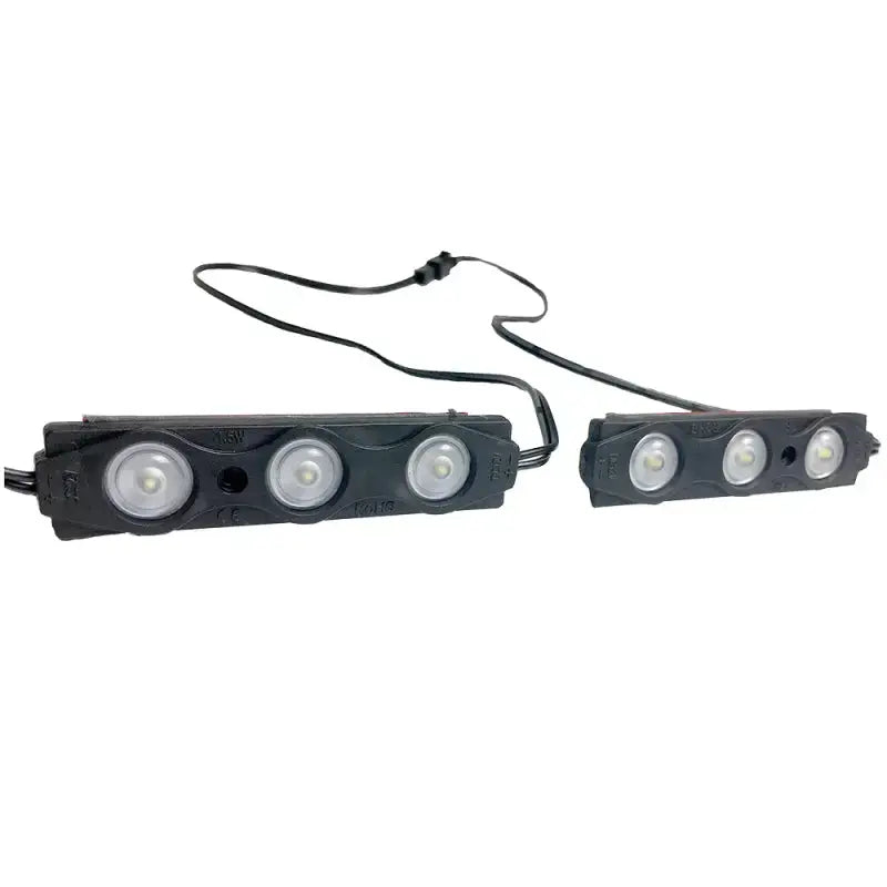 Rock Slide Step Sliders Light Kit featuring two black LED light strips connected with wiring for enhanced visibility.