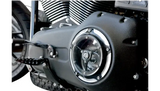Black motorcycle engine with clear cover.