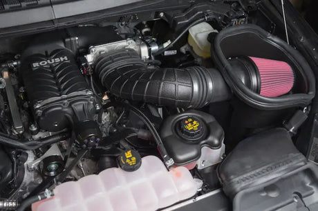 Black Roush supercharged engine from Ford F-150 5.0L V8 calibrated supercharger kit