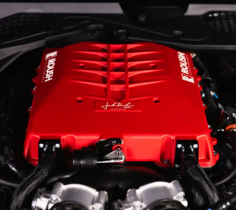 Red Roush supercharger on engine for Ford Mustang GT Dark Horse limited edition launch