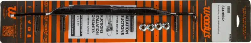 Black cable ties with metal nuts on orange and black striped cardboard for RV parts & accessories