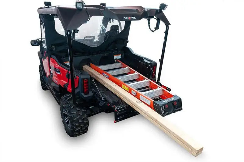 Seizmik Bed Extended Pioneer 1000-5 utility vehicle with ladder and lumber setup