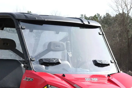 Red utility vehicle with Seizmik Versa-Vent Windshield HC Poly for protection