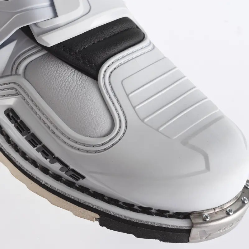 Close-up of Sg 22 Boots Le White Black Light Blue with guard dual metallic toe cap