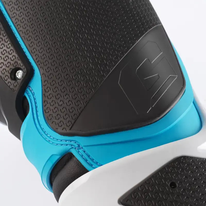 Black, blue, and white athletic shoe with textured panels from Sg 22 Boots Le White/Black/Light Blue 12