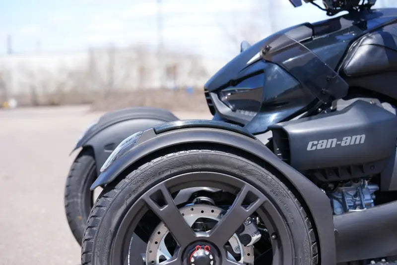 Dark grey Can-Am three-wheeled motorcycle with fender led light and smoke lens