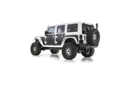 White off-road vehicle featuring Smittybilt Mag-Armor (Set Of 15), providing durable protection and sleek design.