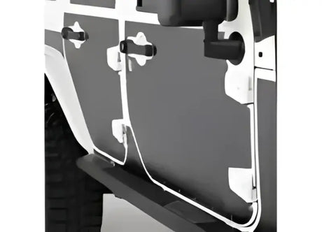 Smittybilt Mag-Armor Set of 15 on vehicle door, offering durable and stylish protection against scratches, dents, and road hazards.