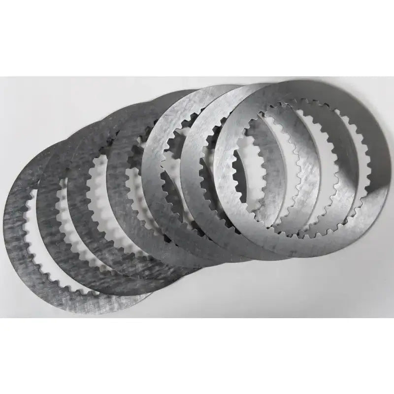 Stack of seven steel clutch plates with serrated edges for sp232-7-001 high production tolerances